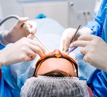 Implant dentist in Salt Lake City performing oral surgery